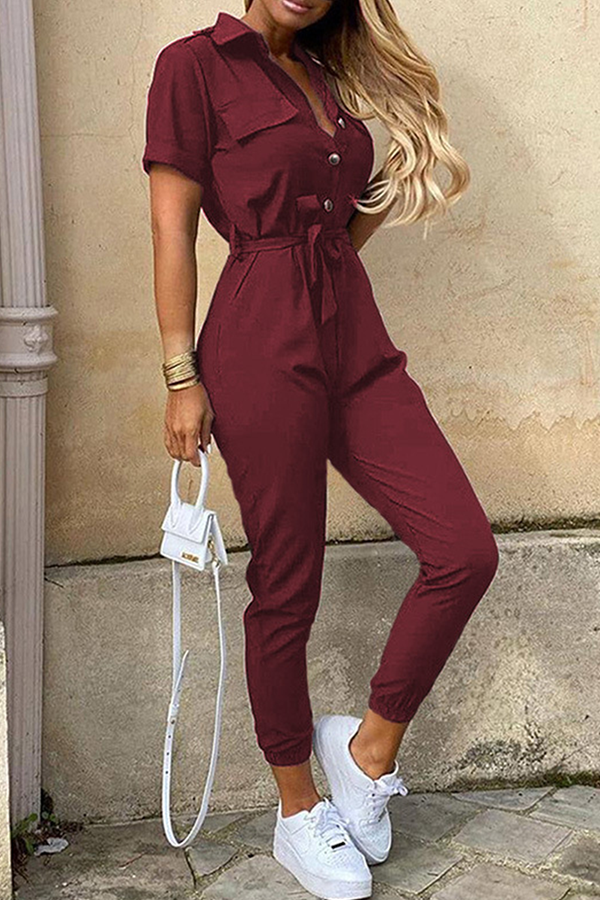 Women's jumpsuit with belt and shawl collar