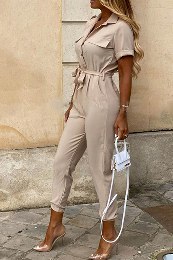 Women's jumpsuit with belt and shawl collar