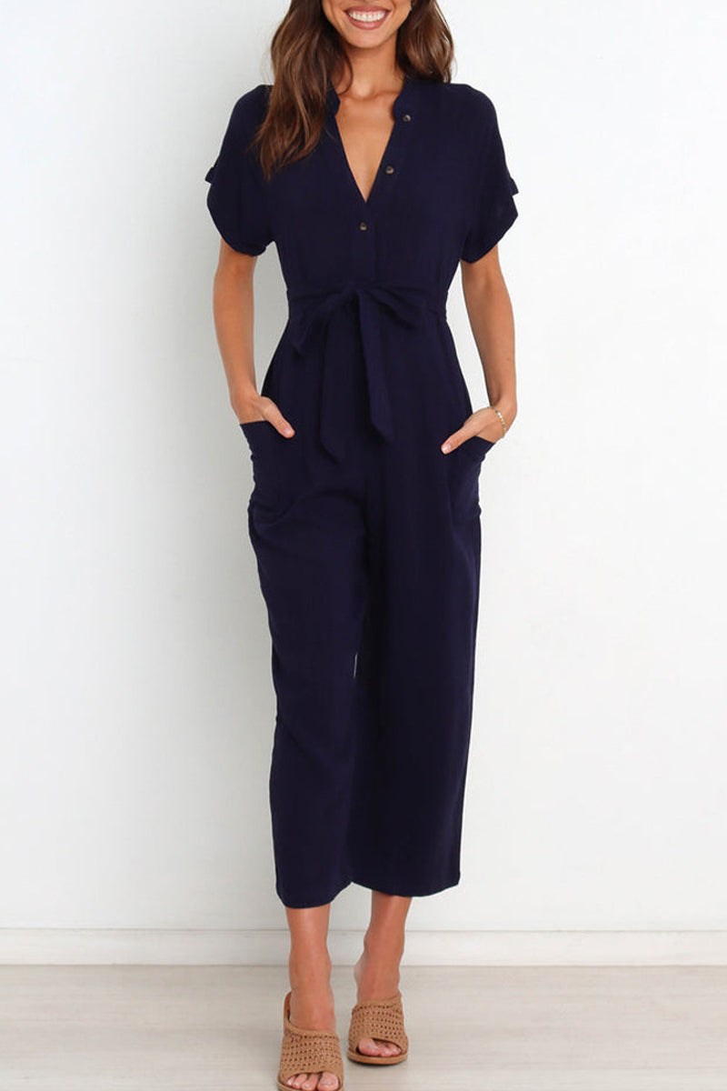 Women's v-neck button down jumpsuit with belt