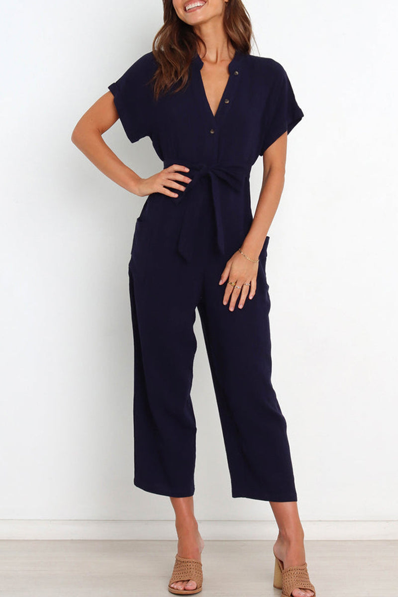 Women's v-neck button down jumpsuit with belt