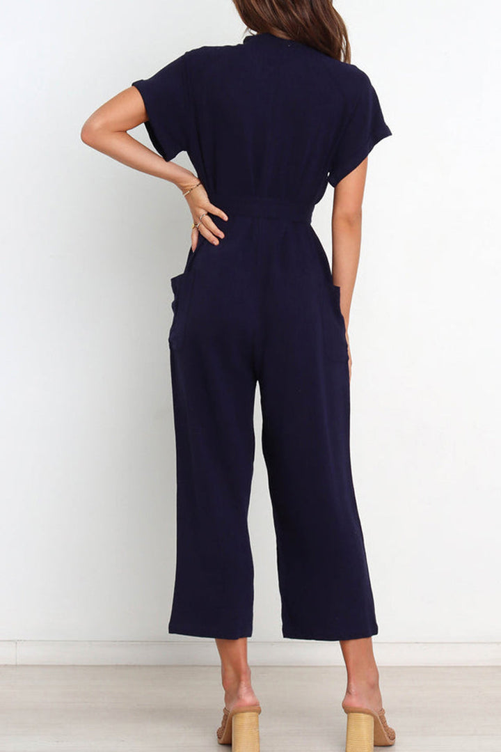 Women's v-neck button down jumpsuit with belt