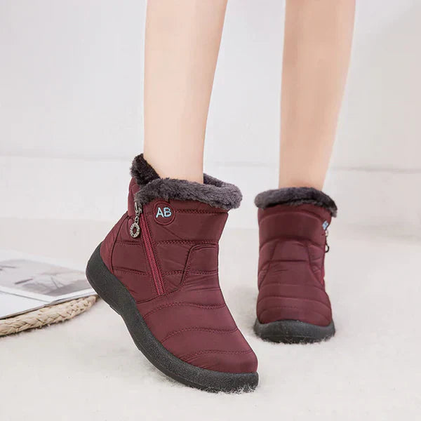 Women's warm winter snow boots with fur trim and zipper closure